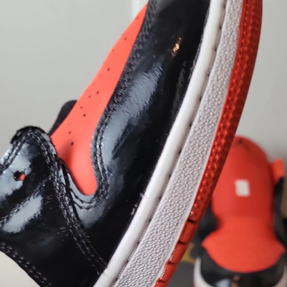 Air Jordan 1 Low Kids Black and Orange Sneakers